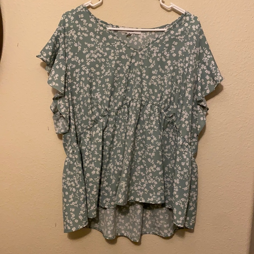 Light green blouse with white flowers